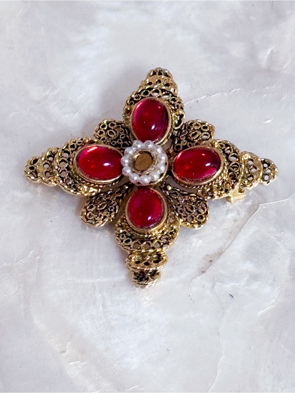 Vtg Sarah Coventry Gold tone filigree Faux Red Cabochon Cross Brooch